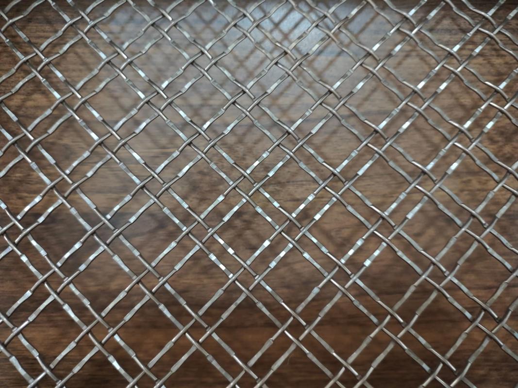 金属编织艺术 不锈钢屏风、幕墙、吊顶与隔断的多样装饰应用